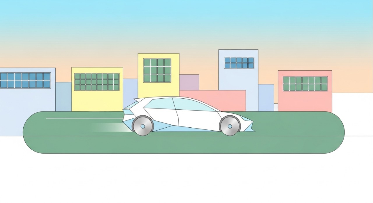 Mobil modern dengan desain aerodinamis sedang melaju di jalanan perkotaan yang hijau